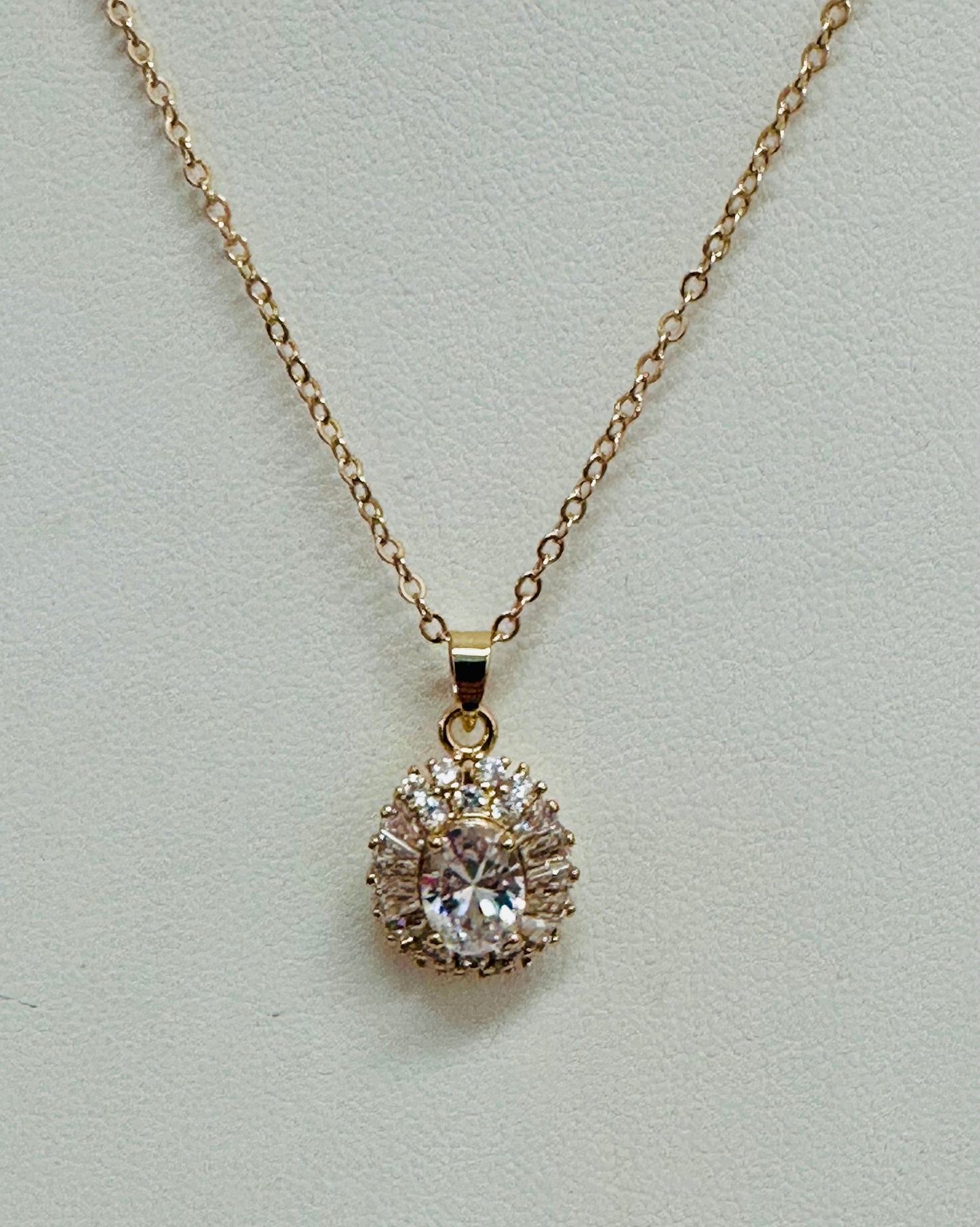 Oval Starburst Halo Pendant Necklace